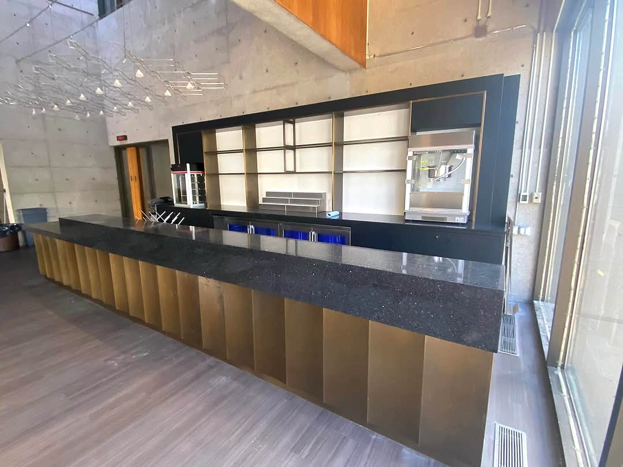 Commercial bar and feature wall cabinetry installation — Hamilton Convention Centre